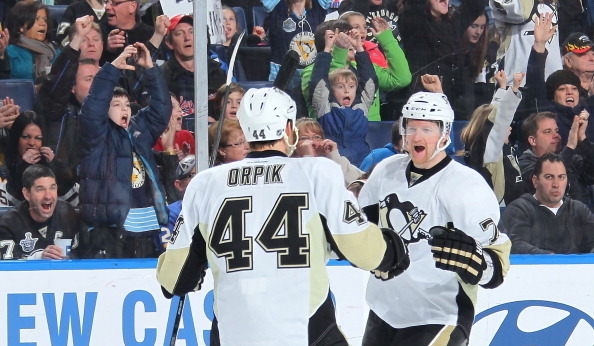 Pittsburgh Penguins Matt Cooke (center) celebrates with Brandon