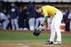 How much will Lowrie cost the A's in 2014?