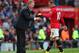 Much to talk about: Moyes and Rooney talk tactics at Old Trafford during United's nervy 3-2 win over Stoke on Saturday