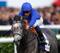 Outstrip carrying the familiar colors of Godolphin.