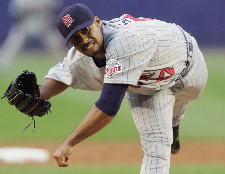 Minnesota Twins starting pitcher Brad Radke delivers a pitch in the first  inning of Game 3 in the American League Divisional Series baseball game  against the Oakland Athletics, Friday, Oct. 6, 2006