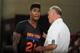 Iman Shumpert and assistant coach Jim Todd talk strategy during the Las Vegas Summer League. Shumpert only played sparingly, sending owner James Dolan into a tizzy.