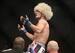 Khabib Nurmagomedov in full tag team garb.