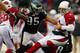 Carson Palmer (right) and the Cardinals fell to the Eagles.