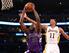 Wesley Johnson (right) flies in for the swat.