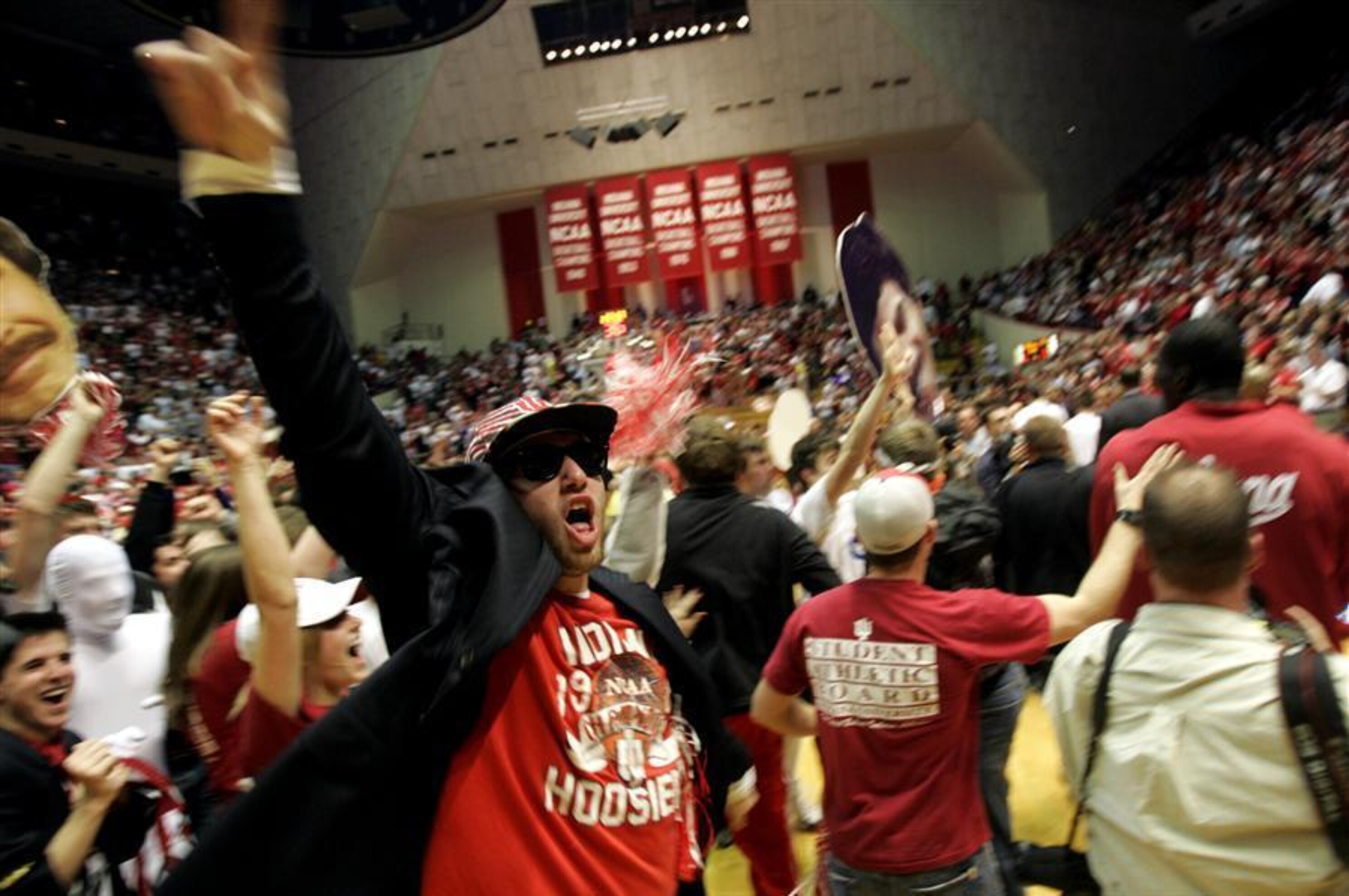 Ncaa Basketball Fans Storming The Court