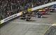 Richmond International Raceway rises up out of a local neighborhood, and that's cool.
