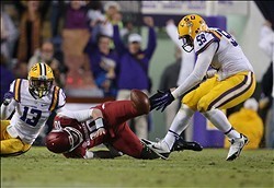 QB Brandon Allen fumbles at LSU.