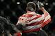 Chris Weidman leaves the cage after defeating Anderson Silva at UFC 168.