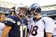 Philip Rivers and Peyton Manning drive similar vehicles at different speeds.