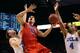 Nick Johnson goes up for a shot against two UCLA defenders in last year's Pac-12 tournament in Las Vegas