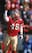 Tim McDonald holds up one of his 20 career interceptions with the 49ers.