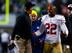 Jim Harbaugh and Carlos Rogers debate the crucial Seattle touchdown.