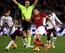 Alfred Duncan and Federico Ceccherini battle Roma's Kevin Strootman.
