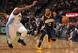C.J. Watson (R) and the Pacers lost to the Denver Nuggets 109-96 on Jan. 25, the second of back-to-back West Coast road games.