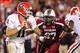 Starting tackle J.T. Surratt (No. 97) closes on Georgia quarterback Aaron Murray.