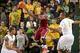 UMass point guard Chaz Williams (center)