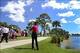 Because of his ailing back, Woods hit the ball in some strange places in the final round at the Honda Classic.