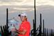 Jason Day poses with his trophy