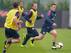 ST ALBANS, ENGLAND - NOVEMBER 18: Jack Wilshire races away from Wayne Rooney during a England Training session at London Colney on November 18, 2013 in St Albans, England. (Photo by Christopher Lee/Getty Images)