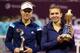 Angelique Kerber and Simona Halep at Qatar 2014.