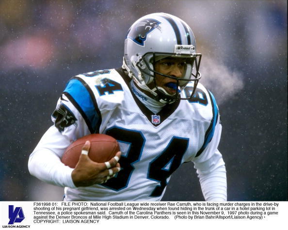 Running back DeShaun Foster of the Carolina Panthers scores on a 33 News  Photo - Getty Images