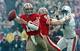 Ayers, seen here saving Joe Montana's butt.