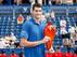 John Isner poses with BB&T Atlanta trophy