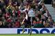 Ashley Westwood celebrates scoring against Manchester United earlier this season.