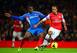 Hull City defender Maynor Figueroa battles Arsenal's Theo Walcott for the ball.
