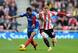 Jack Colback vies for possession with Hull City's Ahmed Elmohamady.