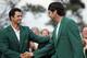 The passing of the green jacket from Adam Scott to Bubba Watson.