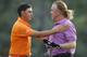Rickie Fowler exchanges congratulations with Miguel Angel Jimenez.