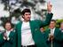 Bubba Watson waves to the crowd after donning the green jacket.