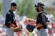 Justin Nicolino, left, and Rob Brantly are two Miami Marlins minor leaguers who will see time in the majors this year.