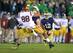 Joe Schmidt breaks up a pass against USC last season.