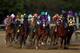 California Chrome turns for home in the Derby.
