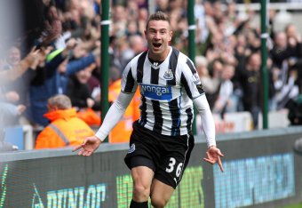 Paul Dummett celebrates after scoring against Liverpool earlier this season