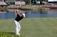 Jimmy Walker takes on the island green 17th at the Players Championship.