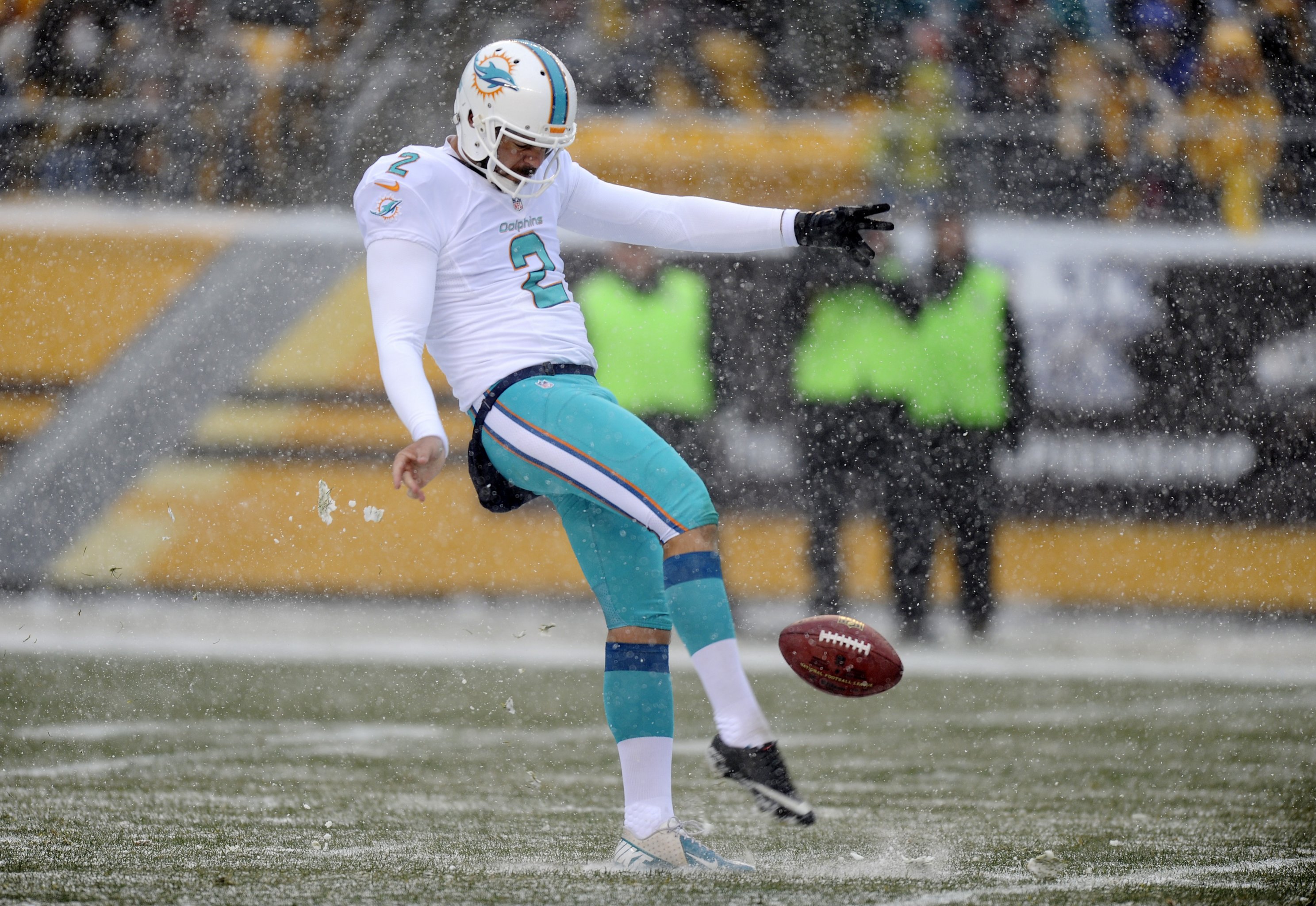 New England Patriots kicker Shayne Graham kicks a field goal in the first  half against the Pittsburgh Steelers out of the hold of Zoltan Mesko during  an NFL football game in Pittsburgh