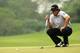 Dufner can't find the hole with the flat stick in his hands.