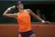 Garbine Muguruza celebrates her fourth-round win at Roland Garros.