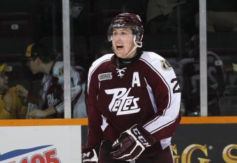 Ritchie shouts at a teammate during a CHL game for Peterborough.