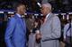 Andrew Wiggins chats with Philadelphia 76ers legend Julius Erving at the NBA draft lottery.