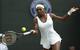 Serena Williams hit a forehand during her third-round match at Wimbledon.