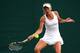 Caroline Wozniacki in her first-round match at Wimbledon, 2014.