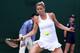 Camila Giorgi concentrates on the ball during her second-round match at Wimbledon.