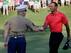Tiger Woods greets a Marine at the National.