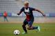 Kingsley Coman on the ball for PSG's youth side during the UEFA Youth League quarterfinal.