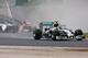 Rosberg's car throws up spray near the beginning of the Hungarian Grand Prix.